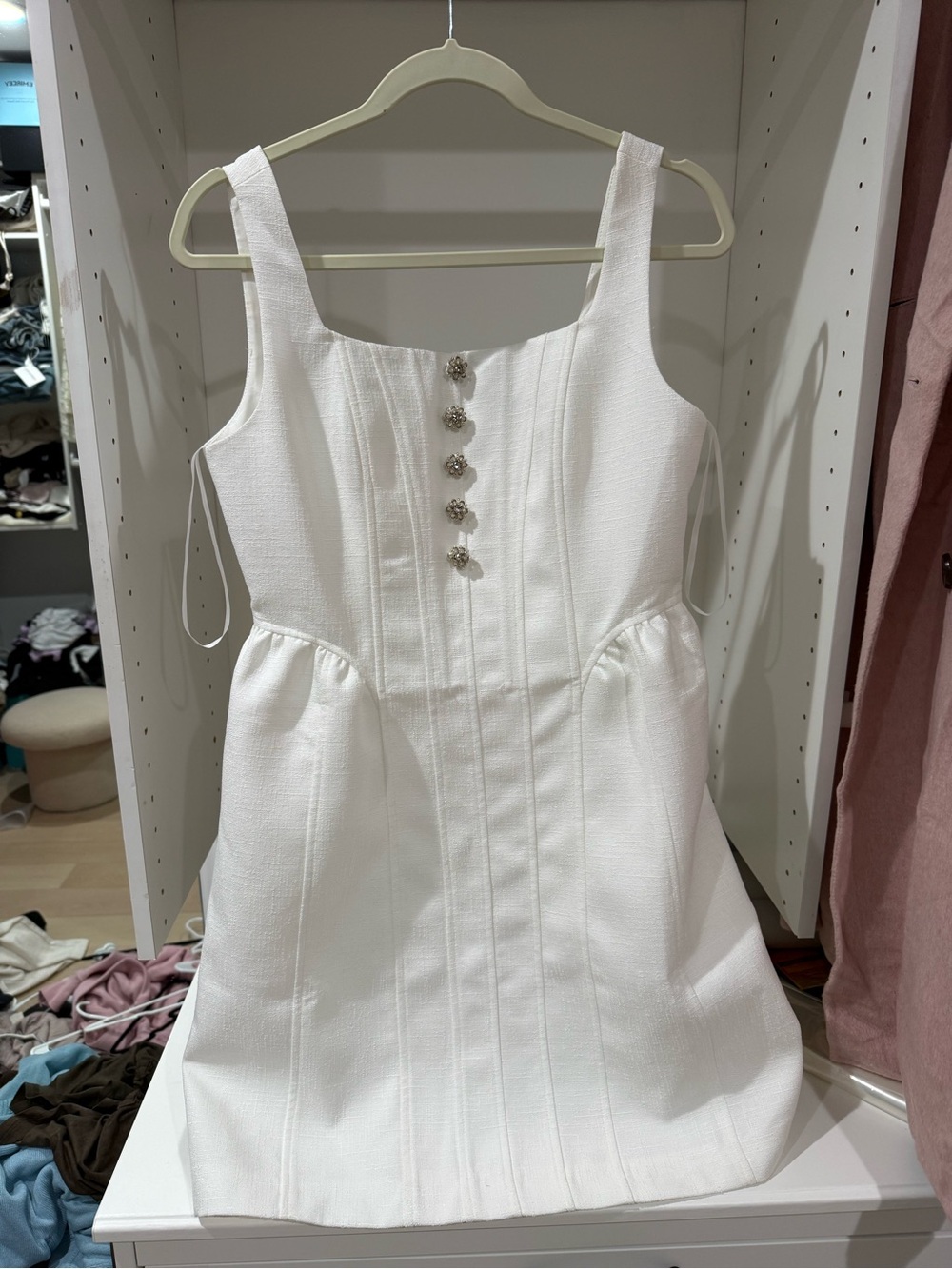 White Sleeveless Textured Mini Dress with Decorative Buttons